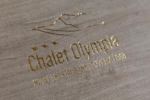 Certificato, attestato, insegna o altro documento esposto da Hotel Chalet Olympia