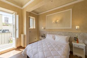 Postel nebo postele na pokoji v ubytování Hotel California