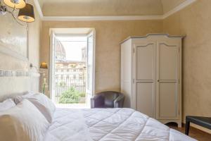 Postel nebo postele na pokoji v ubytování Hotel California