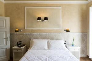 Postel nebo postele na pokoji v ubytování Hotel California