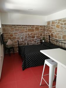 Postel nebo postele na pokoji v ubytování Littel studio Franceska