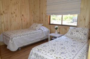 Postel nebo postele na pokoji v ubytování Valle Paraiso