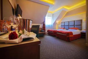 Postel nebo postele na pokoji v ubytování Hotel Galicja Wellness & SPA