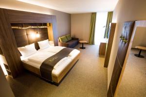 Postel nebo postele na pokoji v ubytování RiKu HOTEL Ulm