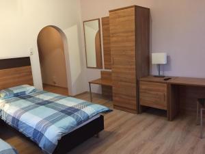 Postel nebo postele na pokoji v ubytování Jujhar's Gästehaus