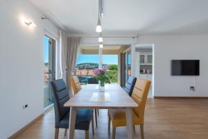 TV a/nebo společenská místnost v ubytování Apartment Maro Bayview