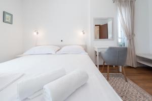 Postel nebo postele na pokoji v ubytování Apartment Maro Bayview