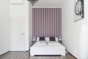 Posteľ alebo postele v izbe v ubytovaní Bright 2BR&AC apt at Astoria