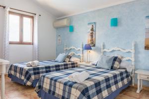Postel nebo postele na pokoji v ubytování Can Corro