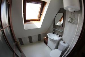 Kúpeľňa v ubytovaní Apartmány Morávka + 17 fotografií