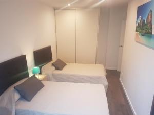 A bed or beds in a room at Migyana Horadada