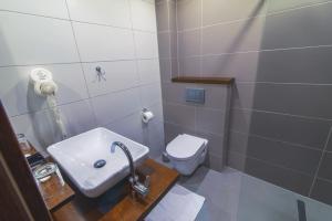 Kúpeľňa v ubytovaní Hotel Arkada