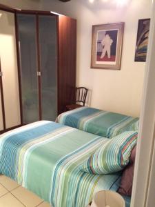 Łóżko lub łóżka w pokoju w obiekcie Antico Vicolo