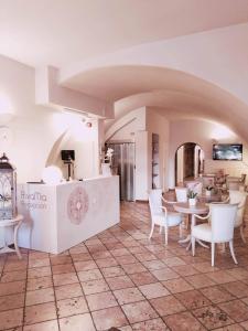 Kuchyň nebo kuchyňský kout v ubytování Hotel RivaMia