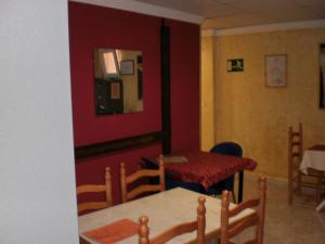 Posezení v ubytování Hostal El Cartero