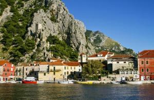 a group of houses and boats on a body of water at City Center LUX Apartment "TONCI" in Omiš