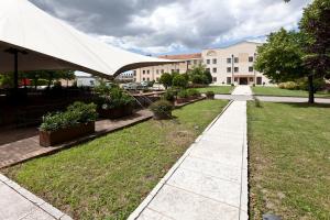 Zahrada ubytování UNA HOTELS Occhiobello