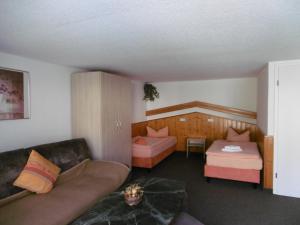Postel nebo postele na pokoji v ubytování Hotel & Pension Aßmann