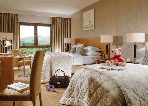 Ένα ή περισσότερα κρεβάτια σε δωμάτιο στο Sneem Hotel