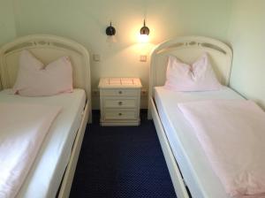 Letto o letti in una camera di Haus Kärnten