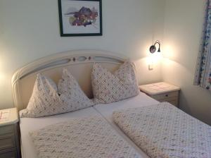 Letto o letti in una camera di Haus Kärnten