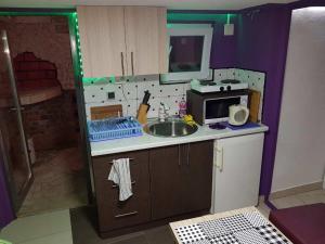 Kuchyň nebo kuchyňský kout v ubytování Rooms Vedran + 23 fotografií