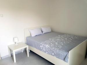 Postel nebo postele na pokoji v ubytování IN Villa Guesthouse