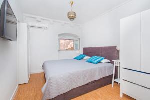 Posteľ alebo postele v izbe v ubytovaní Seagull Apartment