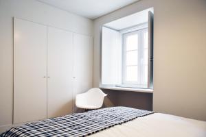 Postel nebo postele na pokoji v ubytování Boavista Bike Apartment