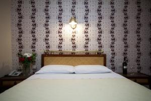 Posteľ alebo postele v izbe v ubytovaní Olympos Hotel