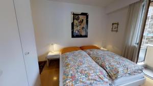 Ein Bett oder Betten in einem Zimmer der Unterkunft Paravicini