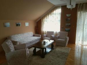 Istumisnurk majutusasutuses Apartment Cace