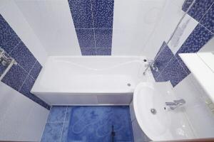 
Ванна кімната в Apartment on Sichovyh Striltsiv
