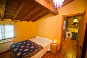 Cama o camas de una habitación en Casa del Herrero