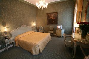 Cama o camas de una habitación en Locanda Ca' del Brocchi