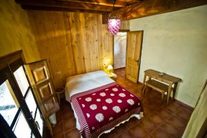 Cama o camas de una habitación en Casa del Herrero