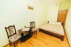 Cama ou camas em um quarto em Apartment on brativ Rohatyntsiv 3
