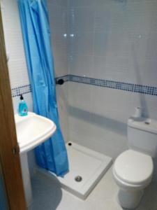 Ванная комната в Apartamento Ria del Eo