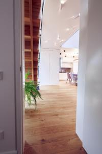 an open door of an office with a dining room at Villa Comfort in Palanga