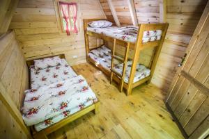 Ένα ή περισσότερα κρεβάτια σε δωμάτιο στο Camp Divlja Rijeka