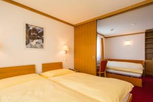 Voodi või voodid majutusasutuse Hotel Excelsior toas