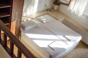 Letto o letti in una camera di La Mirage