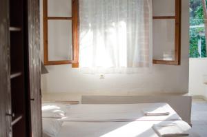 Letto o letti in una camera di La Mirage