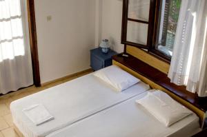 Letto o letti in una camera di La Mirage