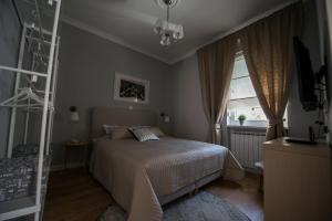 Postel nebo postele na pokoji v ubytování PAVISHA´S PLACE