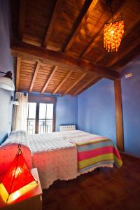 Cama o camas de una habitación en Casa del Herrero