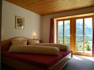 Voodi või voodid majutusasutuse Hotel Preda Kulm toas