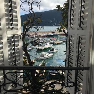 a view of a harbor with boats in the water at Stanica B&B in Herceg-Novi