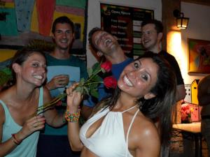 a group of people posing for a picture at a party at Arte Brasileira in Salvador