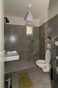Koupelna v ubytování Apartmani Marinović + 8 fotografií